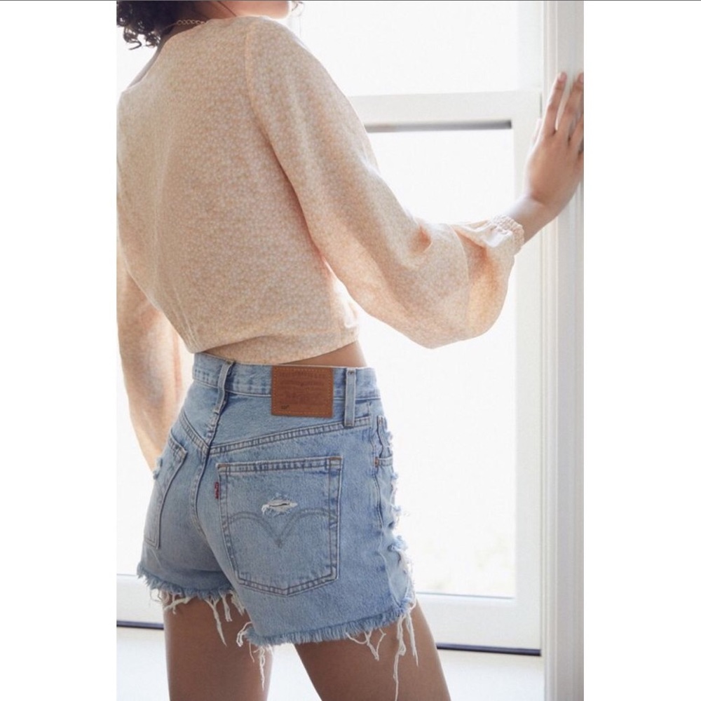 Levi’s 501 High-Rose denim short. Distressed.